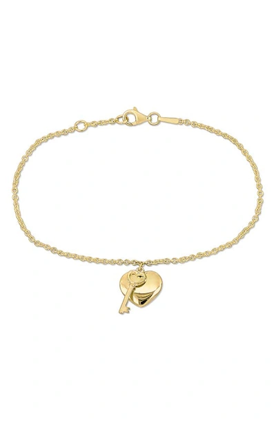 Delmar Heart & Key Charm Bracelet In Gold