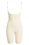 Skims Butt Enhancing Open Bust Bodysuit In Sand