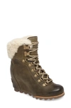 Sorel Conquest Genuine Shearling Cuff Waterproof Boot In Nori/ Stone