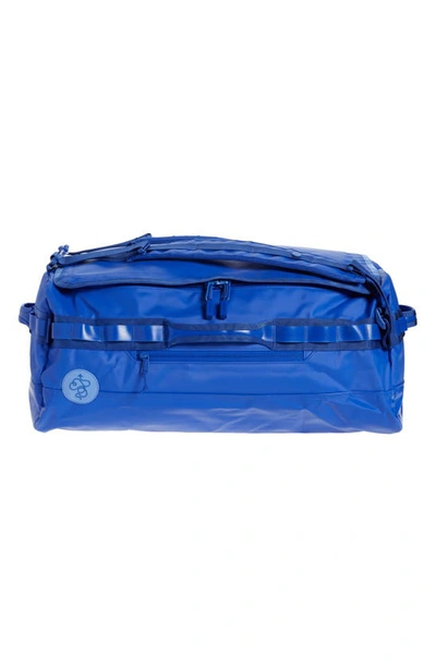 Baboon To The Moon Big Go-bag Waterproof Convertible 60l Backpack In Blue