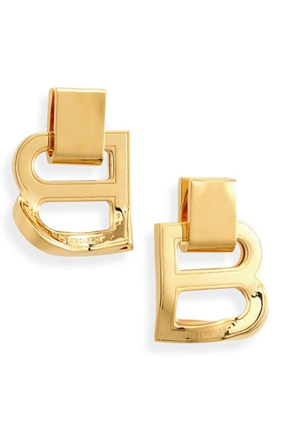 Balenciaga Hourglass Logo Drop Earrings In Gold
