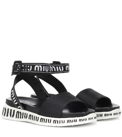 Miu Miu Logo Flatform Sandals In Black