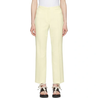 Carven Off-white Crepe Cropped Flared Trousers In 138 Vanilla
