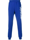 Versace Tapered Ogo-embroidered Oopback Cotton-jersey Sweatpants - Blue