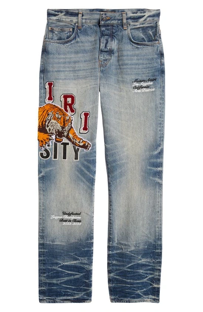 Amiri Varsity Tiger Patch Embroidered Straight Leg Jeans In Vintage Indigo