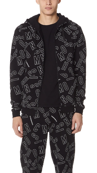 Moschino Allover Print Hoodie In Black