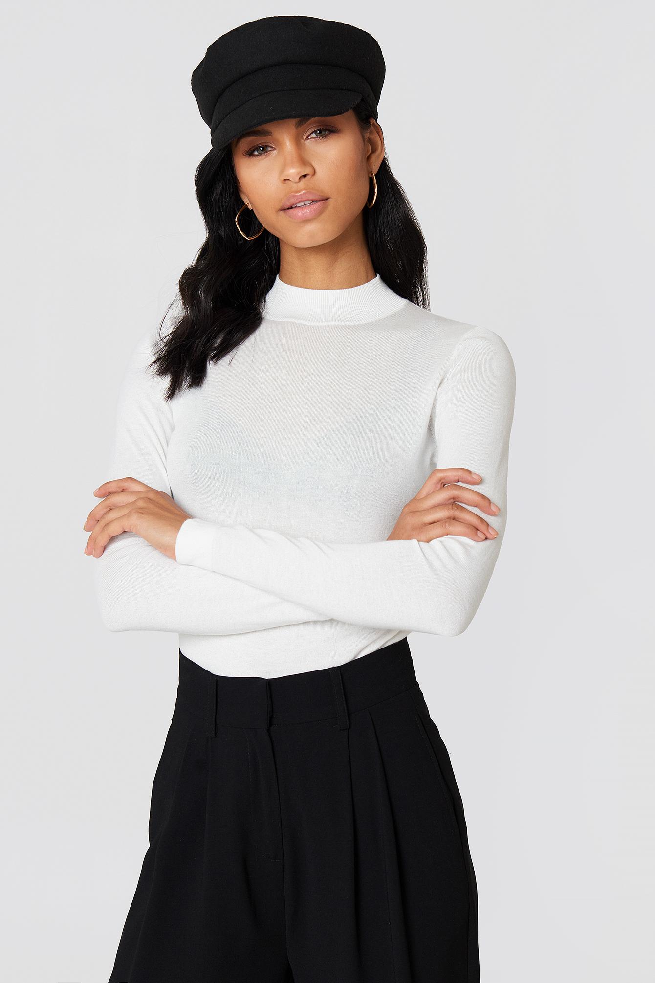 tight white turtleneck top