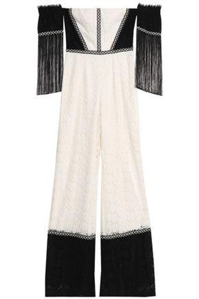 Alexis Off-the-shoulder Fringe-trimmed Corded Lace Jumpsuit In Off-white