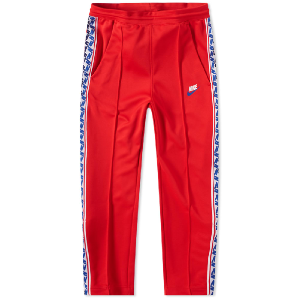 nike sportswear taped track pant