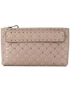 Valentino Garavani Rockstud Spike Clutch In Sand