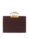 Alexander Mcqueen Knuckle Crocodile-effect Leather Clutch In Burgundy