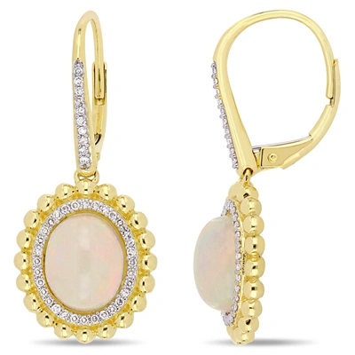 Mimi & Max 4 Ct Tgw Oval-cut Ethiopian Opal And 1/4 Ct Tw Diamond Leverback Earrings In 14k Yellow Gold In White