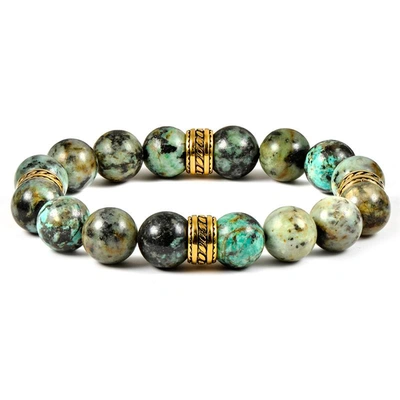 Crucible Jewelry Crucible Los Angeles 12mm African Turquoise Bead Stretch Bracelet With Gold Ip Stainless Steel Triba In Green