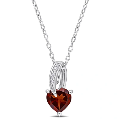 Mimi & Max 1 3/8 Ct Tgw Heart Shape Garnet And Diamond Accent Drop Pendant With Chain In Sterling Silver In Red