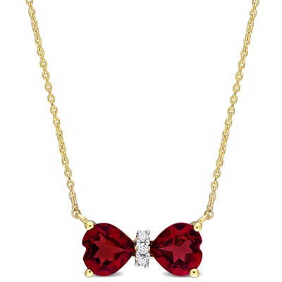 Mimi & Max 1 Ct Tgw Garnet And Diamod Accent Bow Necklace In 10k Yellow Gold In Red