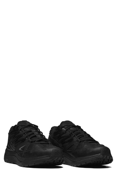 Salomon Gender Inclusive Odyssey Running Shoe In Black/ Black/ Magnet
