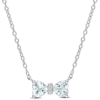 Mimi & Max 3/4 Ct Tgw Heart Aquamarine And Diamond Accent Bow Necklace In Sterling Silver