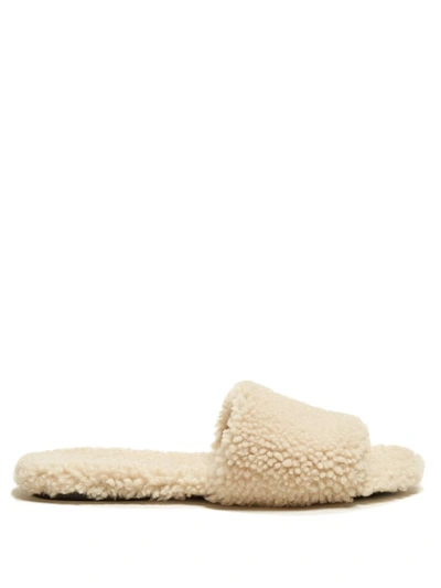 The Row Teddy Bear Shearling Slides In Ecru