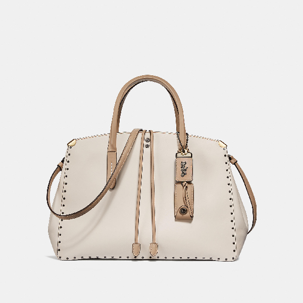 coach cooper carryall with rivets