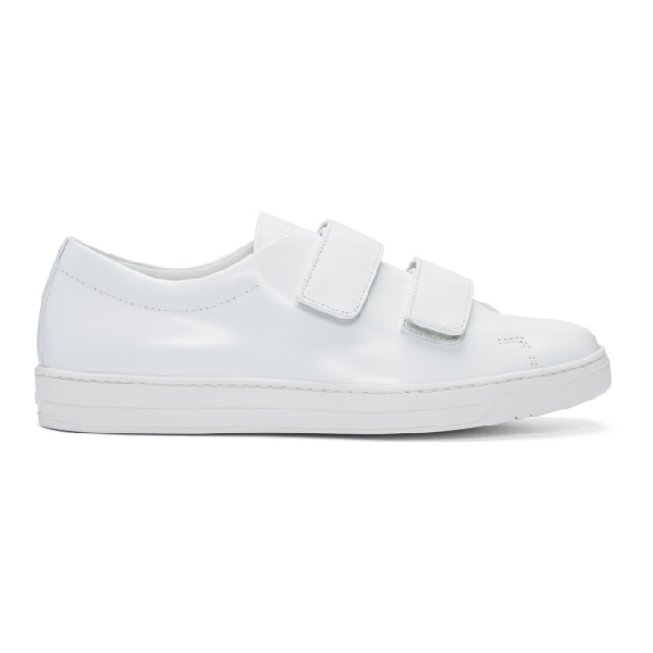 white sneakers with velcro straps