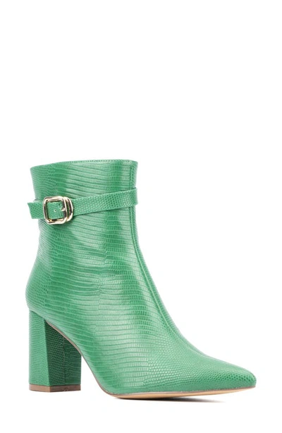 New York And Company Edena Lizard Embossed Bootie In Green Lizard
