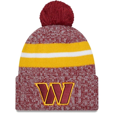 New Era Burgundy Washington Commanders 2023 Sideline Cuffed Knit Hat With Pom