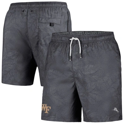 Tommy Bahama Black Wake Forest Demon Deacons Naples Layered Leaves Swim Trunks In Charcoal