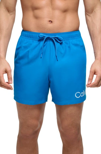 Calvin Klein Solid Core Swim Trunks In Egyptian Blue