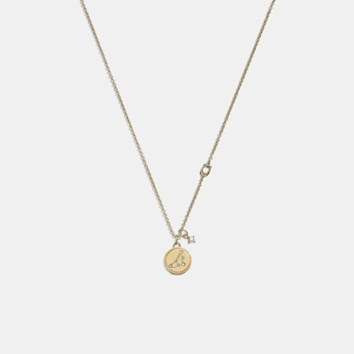 Coach Outlet Capricorn Coin Pendant Necklace In Yellow