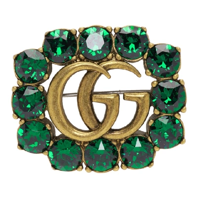 Gucci 金色绿色搭配的 Marmont 宝石胸针 In Green