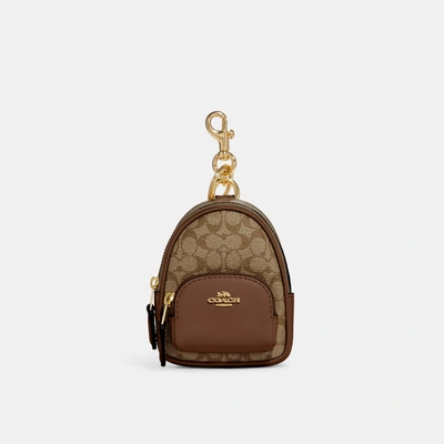 Coach Outlet Mini Court Backpack Bag Charm In Signature Canvas In Brown