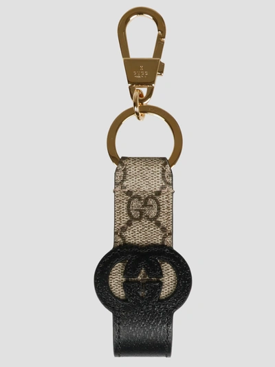 Gucci Cut-out Interlocking G Keychain In Brown
