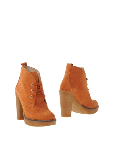 Serafini Etoile Ankle Boots In Orange