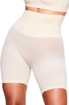 Skims Core Control Mid Thigh Shorts In Sand