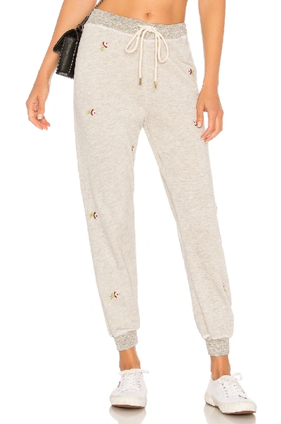 The Great The Cropped Sweatpant In Heather Grey With Rosette Embroidery