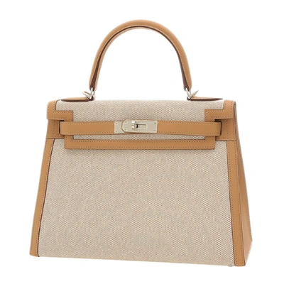 Hermes Hermès Kelly Brown Canvas Handbag ()
