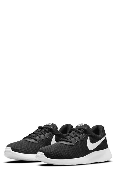Nike Tanjun Athletic Sneaker In Black/white-barely Volt-black