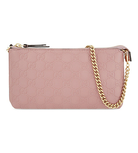 Gucci Gg Signature Embossed Leather Clutch In Rose Baby | ModeSens