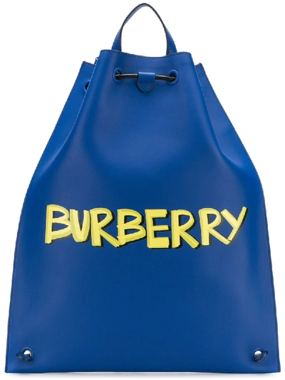 Burberry Graffiti Print Bonded Leather Drawcord Backpack In Denim Blue