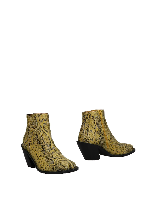 yellow snakeskin ankle boots