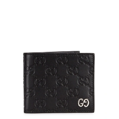 Gucci Dorian Logo-embossed Leather Wallet In Black