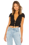 About Us Sara Tie Front Drawstring Top In Black