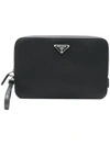 Prada Logo Plaque Zipped Clutch In Black