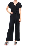 Meghan La Wonderland Surplice V-neck Jumpsuit In Black