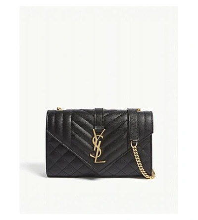 Saint Laurent Black And Gold Monogram Quilted Pebbled Leather Satchel In Black/gold