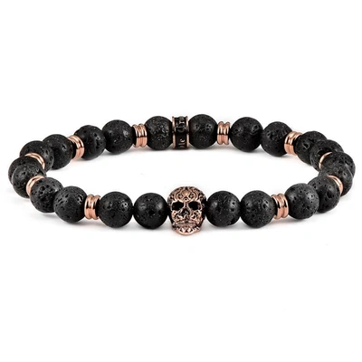 Crucible Jewelry Crucible Los Angeles Polished Stainless Steel Skull And Black Lava Strech Bracelet In Gold