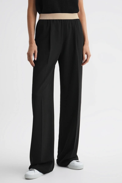 Reiss Iona Elasticated-waistband Mid-rise Tapered-leg Woven Trousers In Black