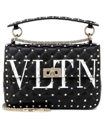 Valentino Garavani Garavani Rockstud Spike Medium Leather Shoulder Bag In Bianco Ottico/nero