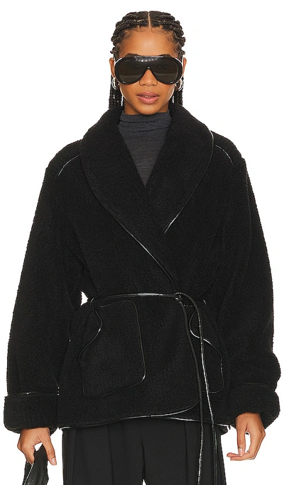 Simkhai Kimia Belted-waist Shearling Jacket In Black