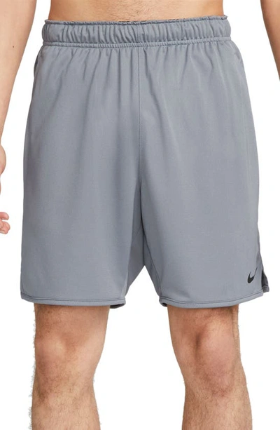 Nike Dri-fit 7-inch Brief Lined Versatile Shorts In Smoke Grey/ Black